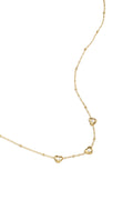 Ketting met bolletjes en hartjes met steen