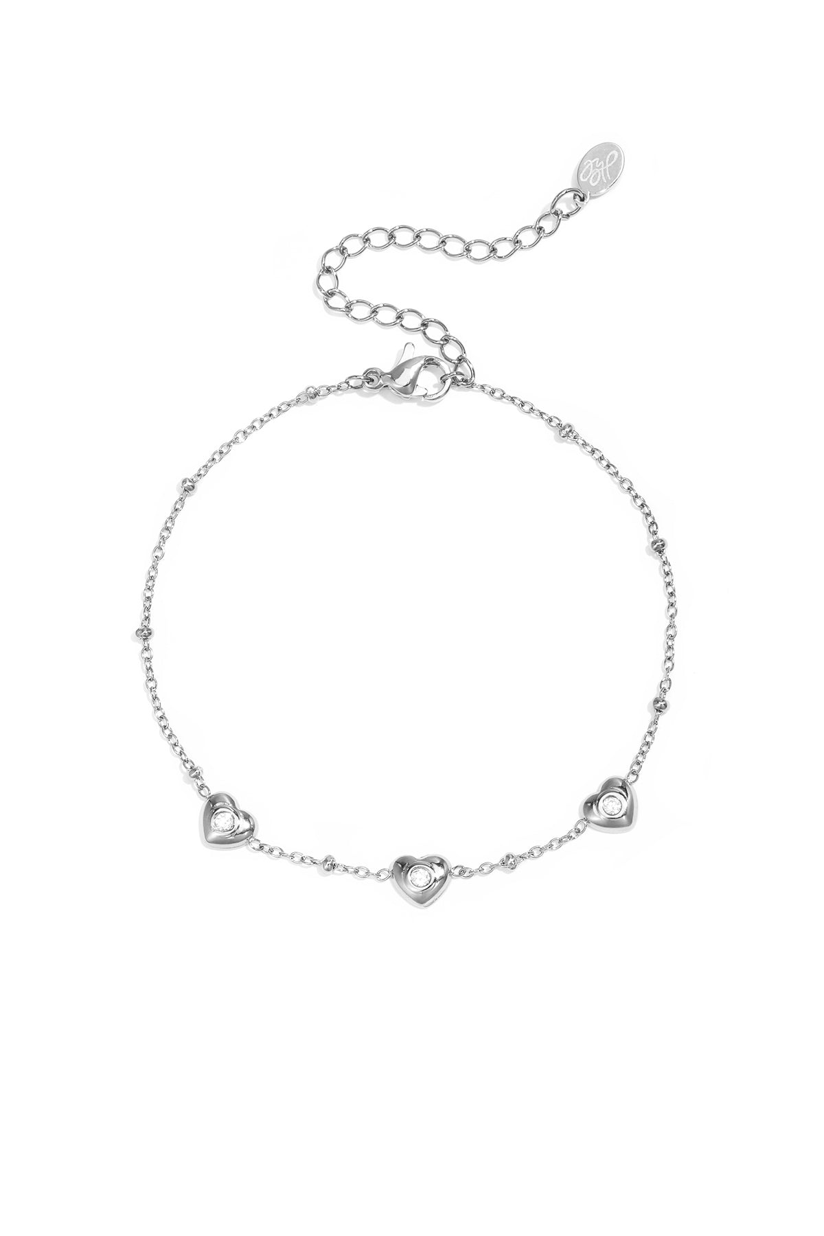 Armband met bolletjes en hartjes met steen
