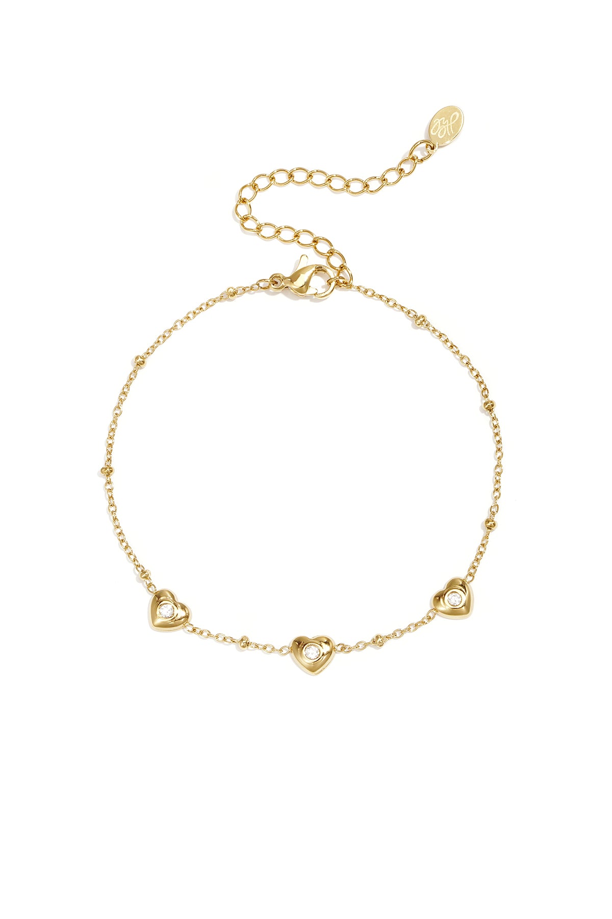 Armband met bolletjes en hartjes met steen