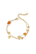 Charm bracelet with orange beads, flowers and hearts