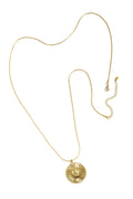 Necklace with flat details and large pendant