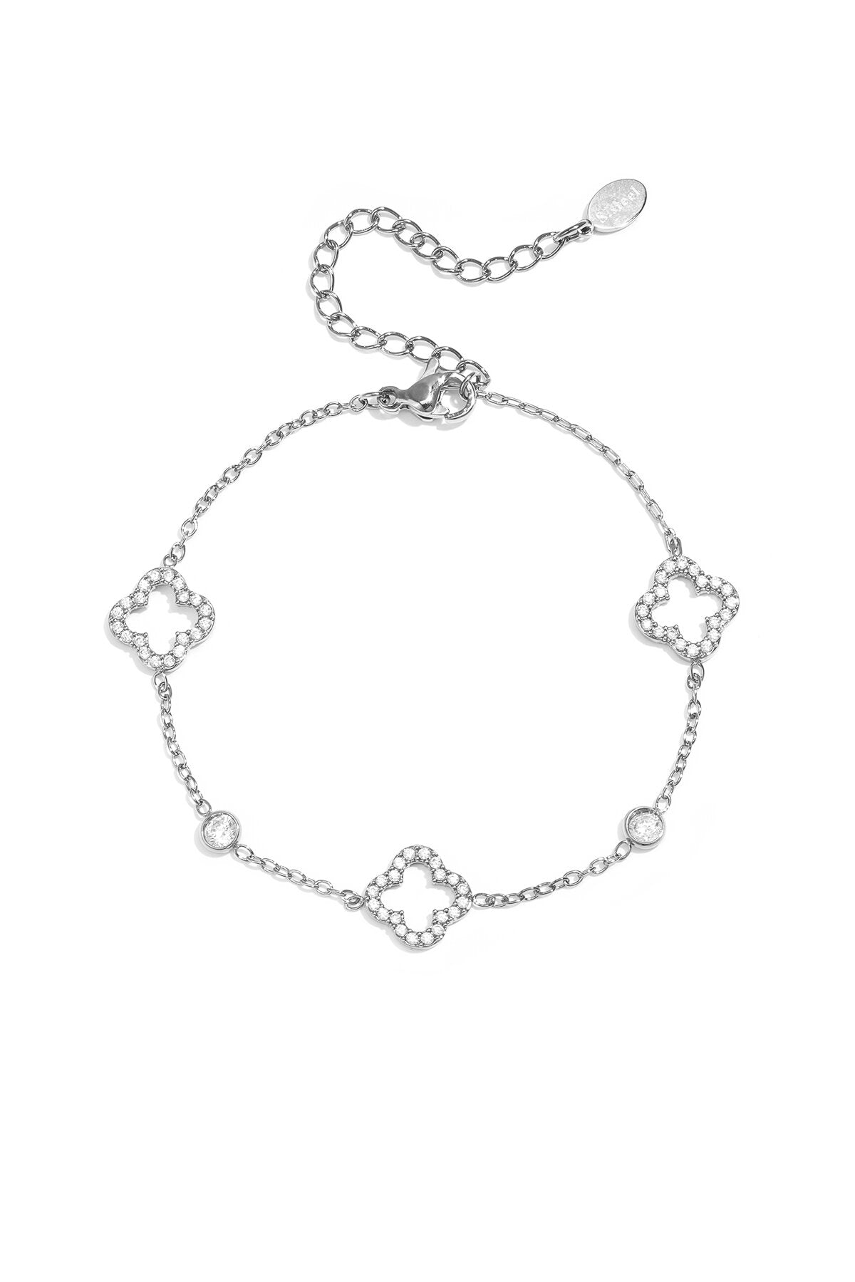 Armband met opengewerkte en belegde klavers en steentjes