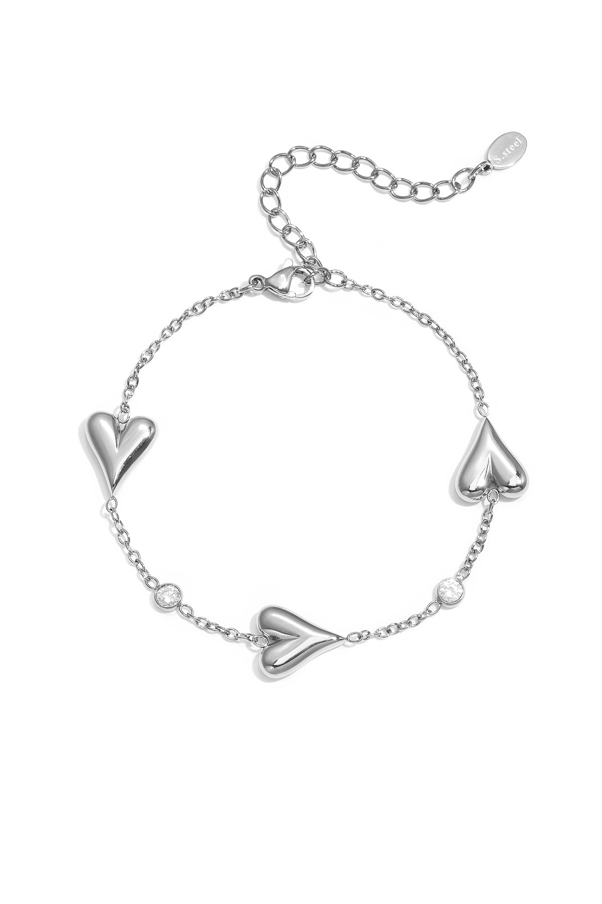 Armband met drie massieve harten en steentjes